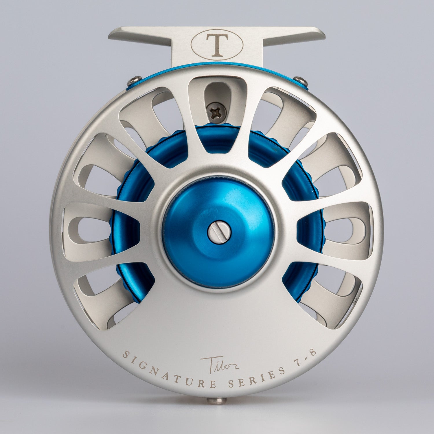 Tibor Reels - Signature Series - Frost Silver with Blue