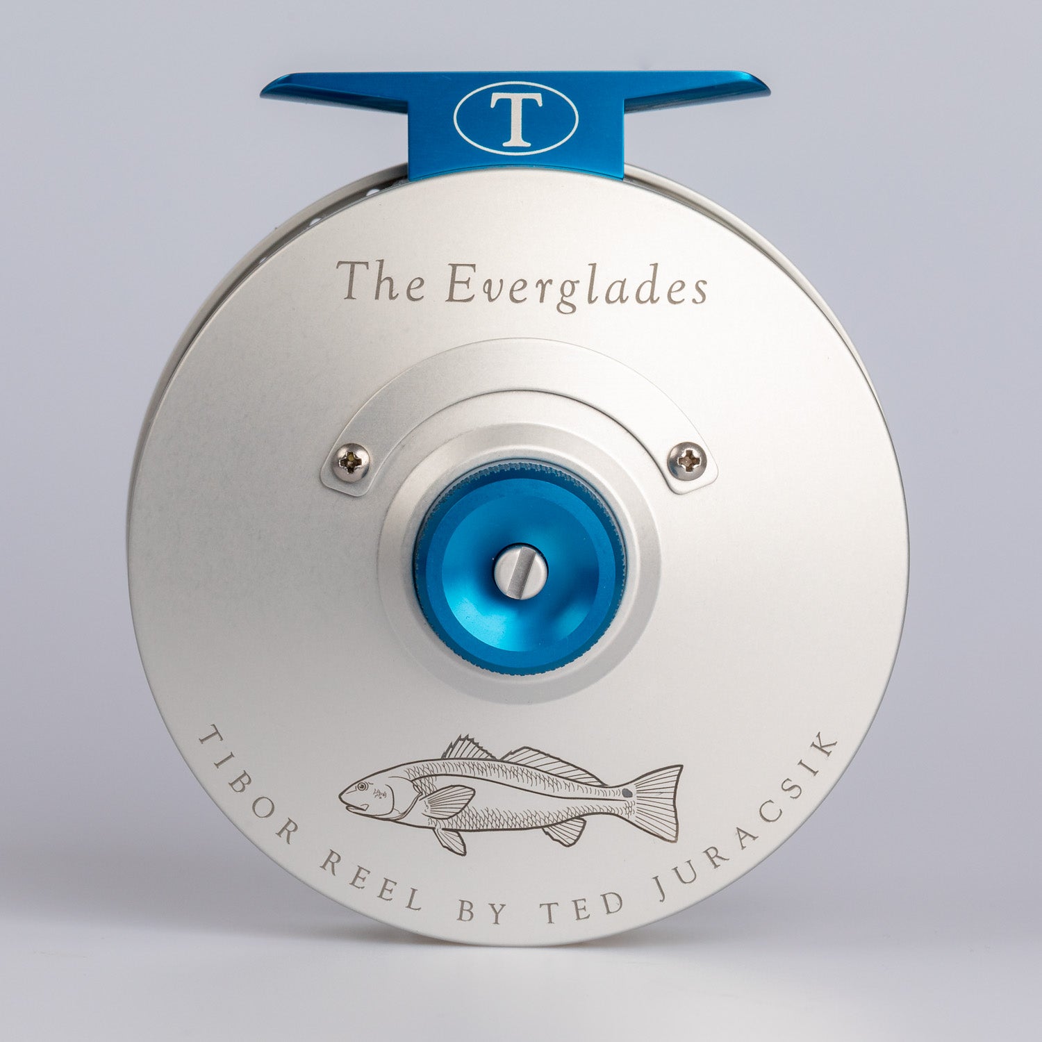 engraved fishing reel Tibor Reels - The Everglades - Frost Silver - Custom Redfish Engraving